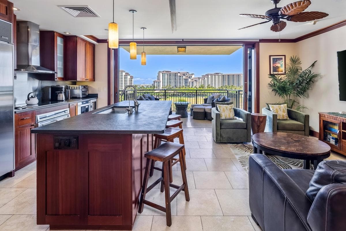 The sliding lanai doors recess fully in the walls to bring the outdoors in